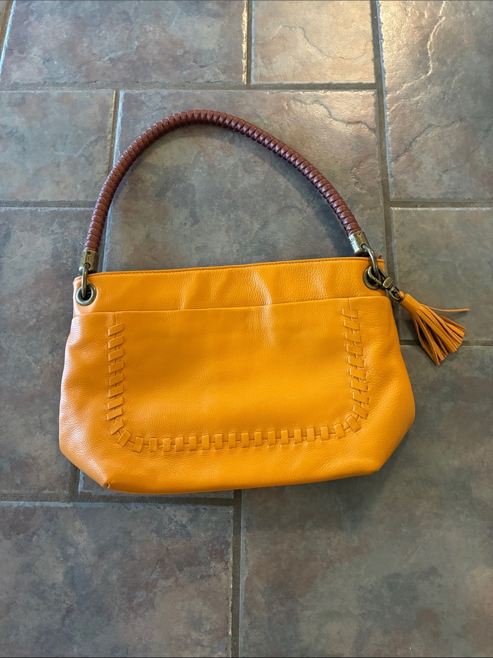 The Sak Dark Yellow Leather Shoulder Bag with Braided Handle and Tassel